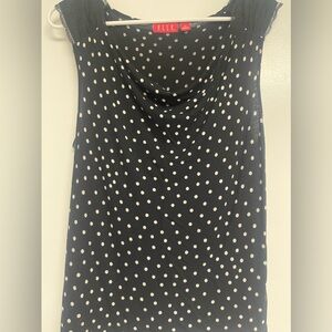 Elle, black and white polka dot cap sleeve shirt